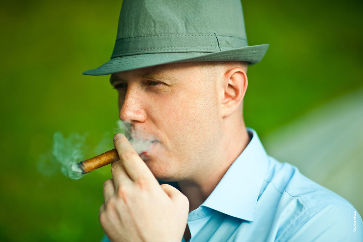 Фотопортрет мужчины с сигарой